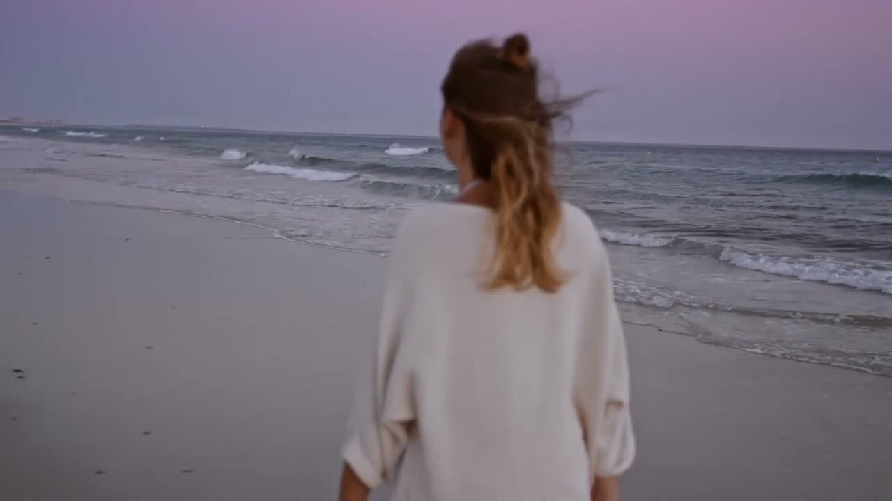 Woman beside the ocean